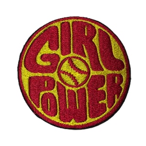 May include: A red and yellow embroidered patch with the words "Girl Power" in a circular design. A softball is in the centre of the patch.
