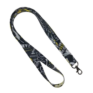 May include: Black and yellow lanyard with a white print of baseball-themed graphics and text that says "Go Gators! Keep Up! Great Team!"