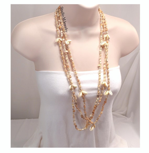Video su Qual è Collana con pendente a conchiglia boho retrò per donne, non ossidabile