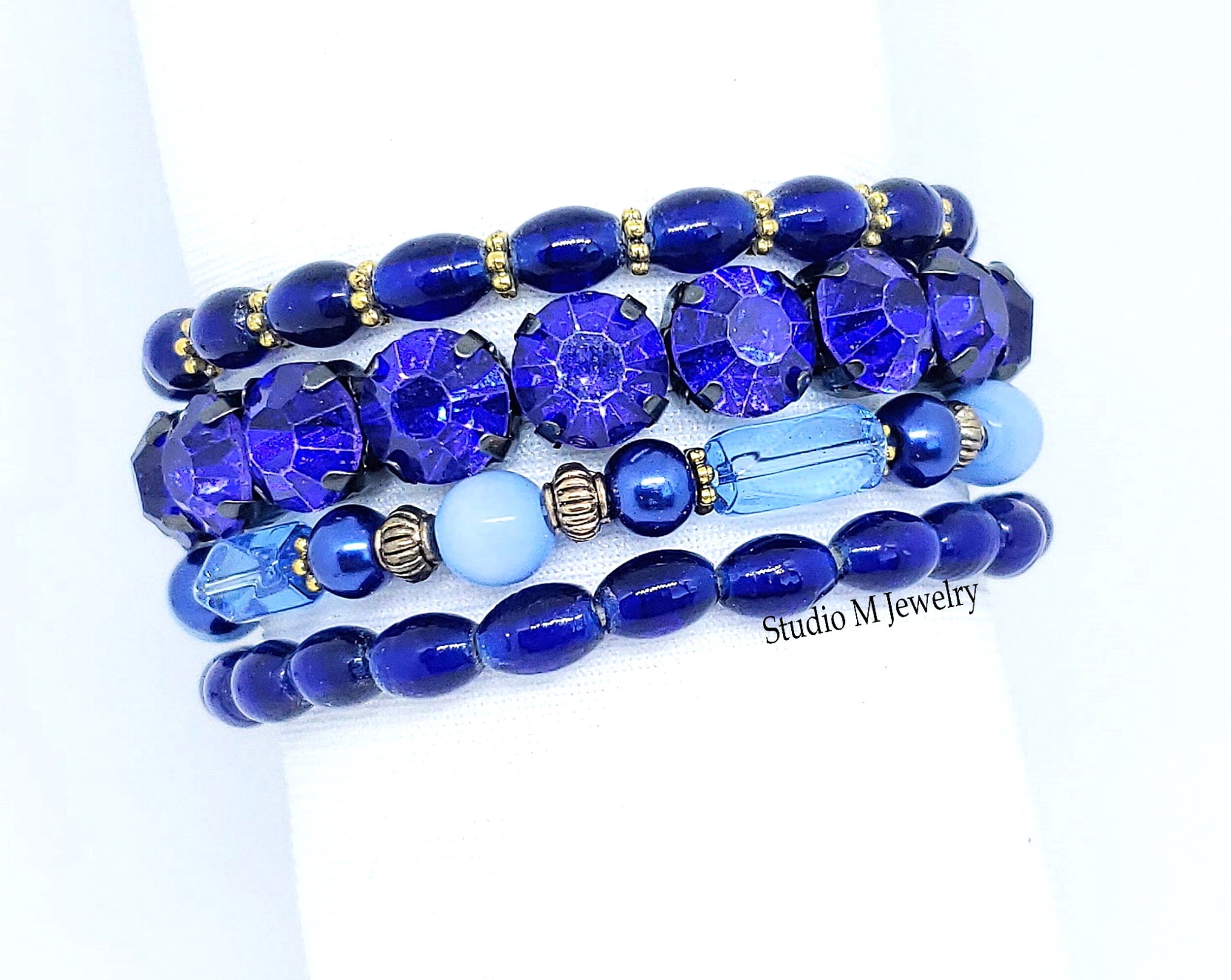 Navy blue deals and gold bracelets