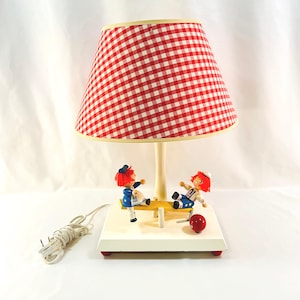 1970&#39;s Musical Raggedy Ann and Andy Lamp, Wind Up and The Teeter Tooter Moves Very Slowly and So Does The Song, Made in Japan