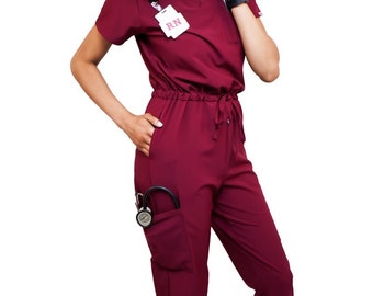 Burgundy jumpsuit scrub soft stretch fabric. Runs big. Has Zipper at the crotch for bathroom break. Also at www.Jocciniscrubs.com