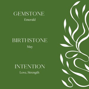 May include: Green background with white text and a white stylized floral design. The text reads "GEMSTONE Emerald BIRTHSTONE May INTENTION Love, Strength"