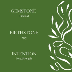 May include: Green background with white text and a white floral design. The text reads "GEMSTONE Emerald BIRTHSTONE May INTENTION Love, Strength".