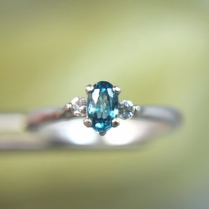 Blue Zircon Sterling Silver Ring: White Topaz Accents, December Birthstone