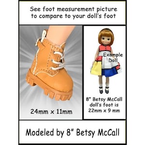 May include: A tan leather-style doll boot with white laces, a side buckle, and a thick lug sole. Text reads: See foot measurement picture to compare to your doll's foot, 24mm x 11mm, Example Doll, 8" Betsy McCall doll's foot is 22mm x 9 mm, Modeled by 8" Betsy McCall.