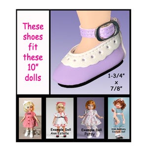 May include: A lavender doll shoe with a white scalloped trim and a silver buckle. The shoe measures 1-3/4" x 7/8" and fits 10" dolls. The text on the image says "These shoes fit these 10" dolls."