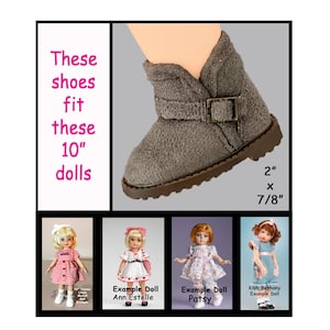 May include: A set of three ceramic mugs with a speckled, matte finish. The mugs are in shades of cream, light gray, and dark gray. Each mug has a simple, minimalist design, perfect for coffee or tea.