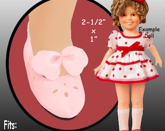 May include: A vintage Shirley Temple doll wearing a white dress with red polka dots and a red bow. The doll has curly blonde hair and red shoes. The image also shows a close-up of a pink shoe with a bow, measuring 2.5" x 1".