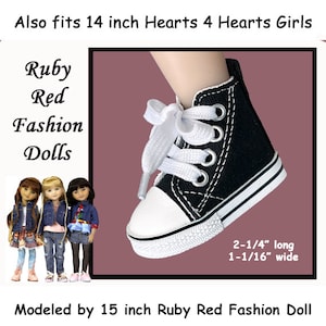 May include: Black high-top doll sneaker with white laces and a white toe cap. The shoe is 2-1/4 inches long and 1-1/16 inches wide. The image also shows three dolls and the text "Ruby Red Fashion Dolls."