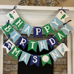 May include: A green, blue, and white banner with the words "Happy Birthday Mason" and golf-themed illustrations.