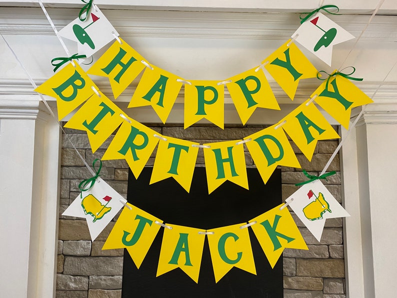 May include: A yellow and green banner with the words "Happy Birthday Jack" and golf-themed decorations.