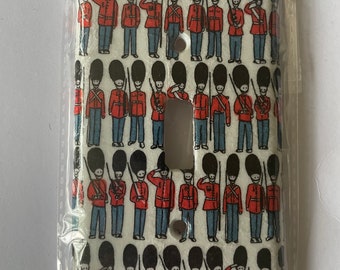 decoupaged lightswitch cover.  Cath kidston.  British soldiers.