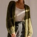 see more listings in the Pulls & Cardigans section