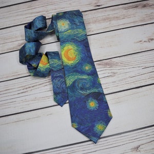 May include: A blue silk tie with a print of Van Gogh's Starry Night.