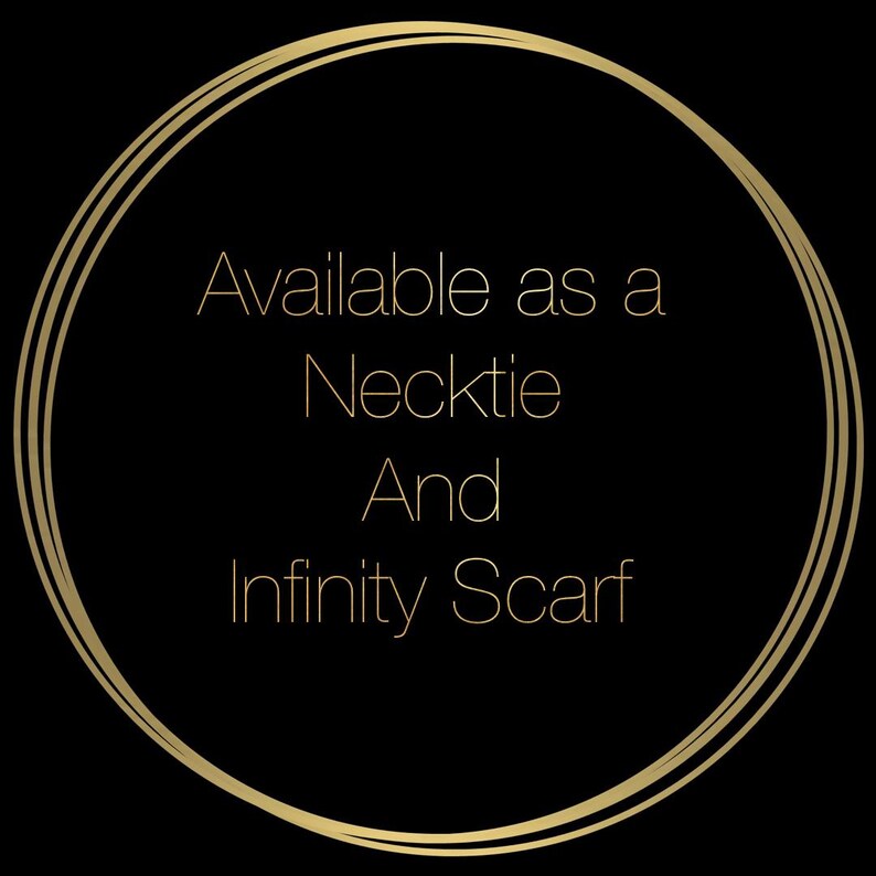 May include: Gold circle with the text "Available as a Necktie And Infinity Scarf" on a black background.