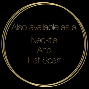 May include: A gold circle with the text "Also available as a Necktie And Flat Scarf" inside.