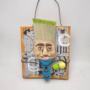 Mixed media assemblage art doll wall hanging