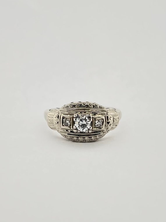 14k White Gold Estate Ring with .25ct VS1 and Sing