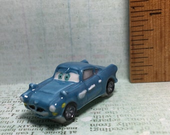 CARS Finn Mcmissile Disney Pixar Blue Race Car Movie French Feve