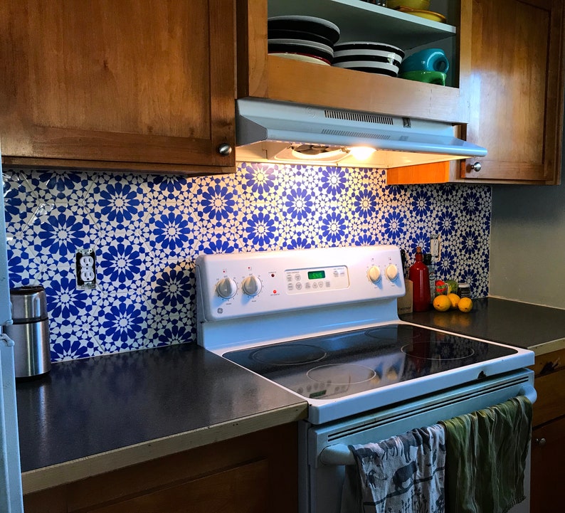 blue and white ceramic tile backsplash