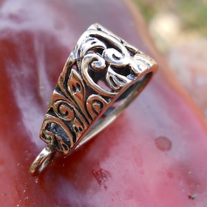 Bronze Bail, BA74B, Size:30 mm x 10 mm or 1.18 inches x .39 inches. The bail opening is 14 mm by 10 mm.