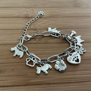 Scottie dog charm bracelet- dog symbols, 4 Scottish terrier charms , heart, flower charms