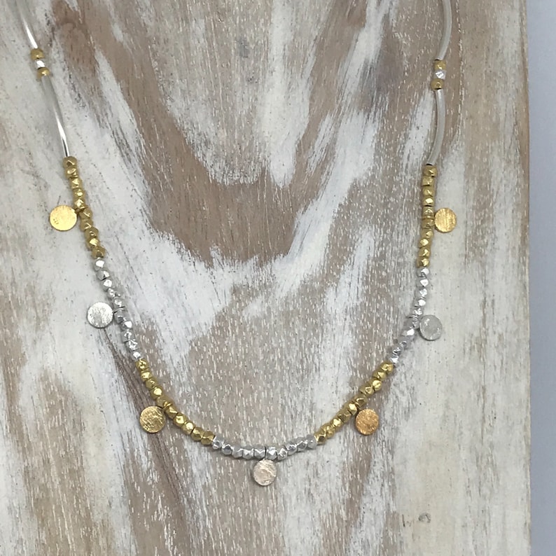 Handmade Silver and gold fill disc necklace with hammered delicate beads