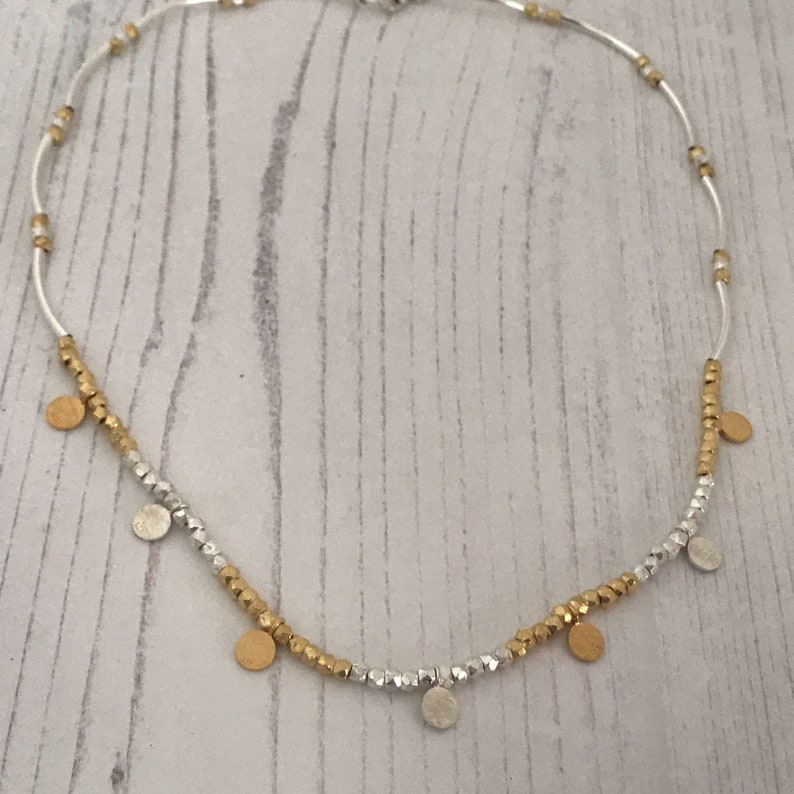 Handmade Silver and gold fill disc necklace with hammered delicate beads