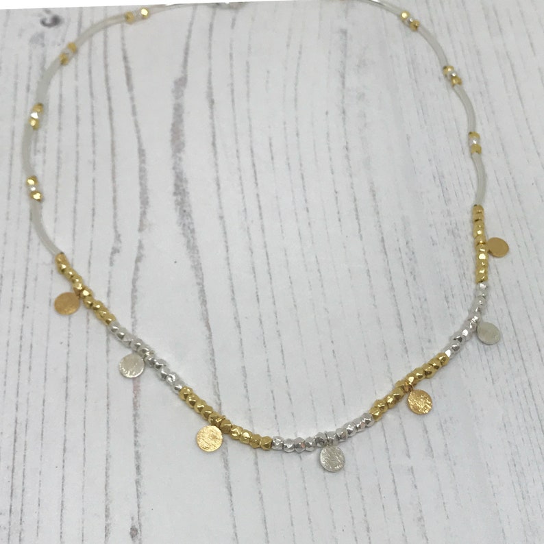 Handmade Silver and gold fill disc necklace with hammered delicate beads