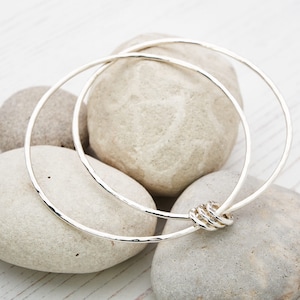 Handmade hammered silver double bangle with 3 silver rings