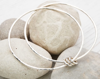 Handmade hammered silver double bangle with 3 silver rings