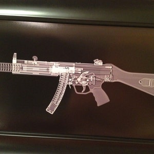 May include: An x-ray style illustration of a semi-automatic firearm, revealing its internal workings. The image, set against a dark backdrop, displays the gun's components in detail. The design offers a transparent view of the weapon's internal mechanisms.