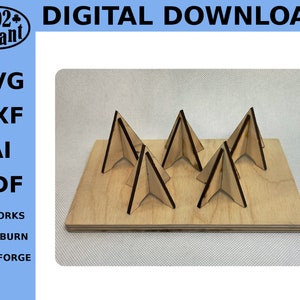 May include: A set of six wooden triangle shapes on a light brown wooden board. The triangles are designed to be used as display stands for small items. The image includes the text "DIGITAL DOWNLOAD" and "SVG, DXF, AI, PDF, RDWORKS, LIGHTBURN, GLOWFORGE".