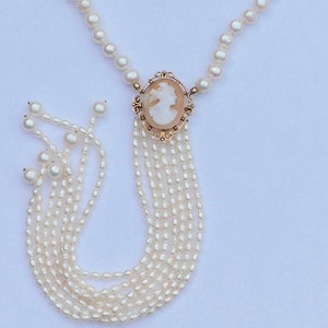 Hand-knotted pearl necklace with hand-carved antique shell cameo in gold edge, setting and 14 carat gold spring clasp image 1