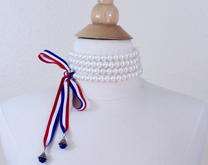 Warp around pearl choker with red white and blue ribbons