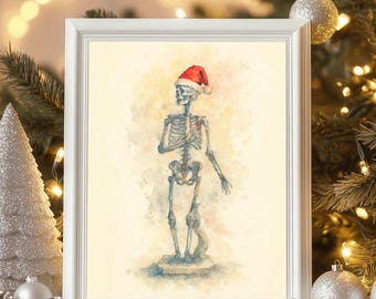 Op de afbeelding: Een ingelijste aquarelprint van een skelet met een rode kerstmuts. Het skelet staat op een blauwe basis, tegen een lichtgele en beige achtergrond. De print zit in een witte lijst, met kerstversieringen op de achtergrond.