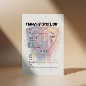 May include: A white card with the text "PRIMARY SPOTLIGHT" at the top. It includes prompts for name, age, and favorites, with a space for a photo. The design features a watercolor splash in shades of orange, purple, and blue.