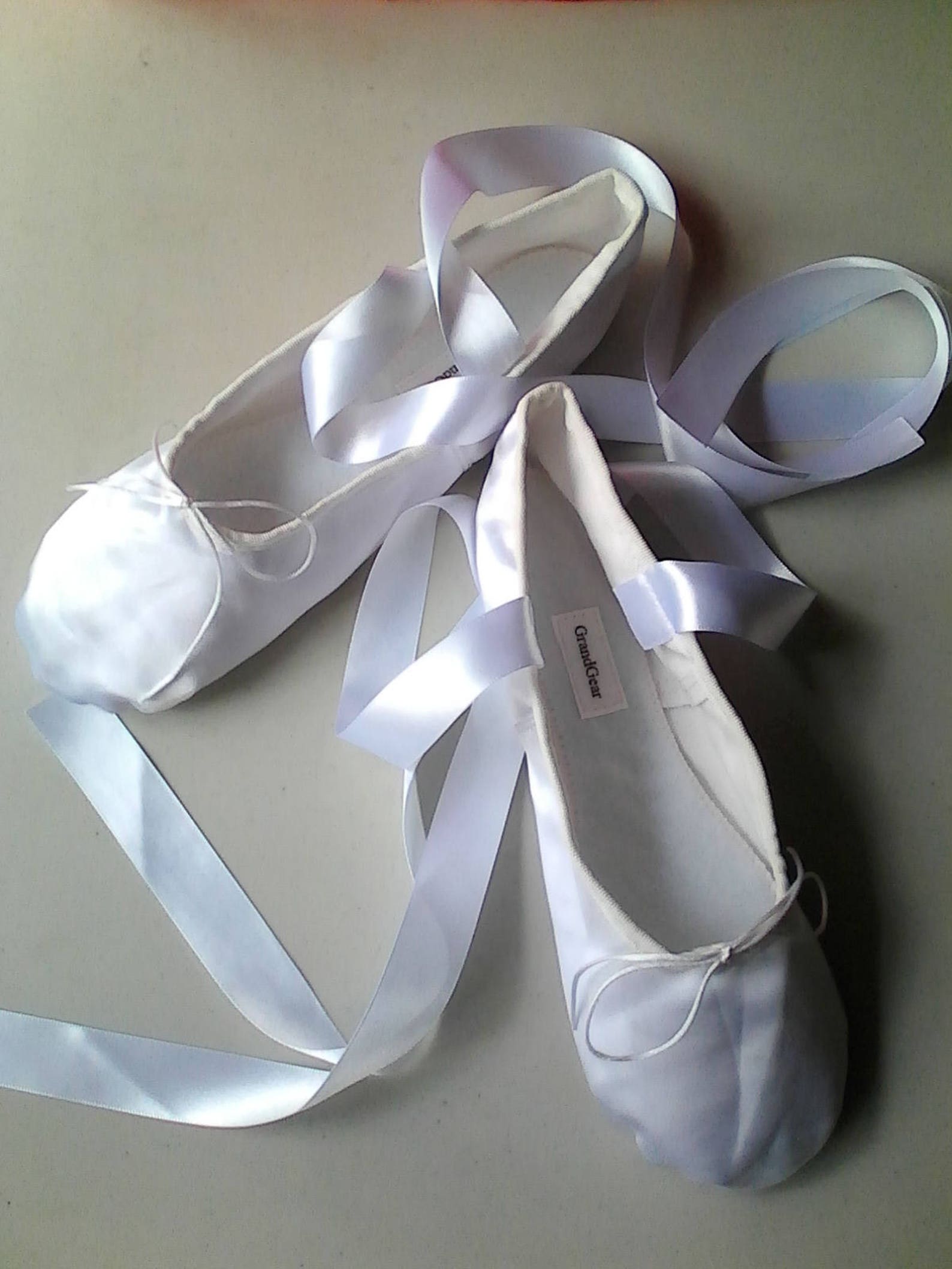 white satin ballet slippers