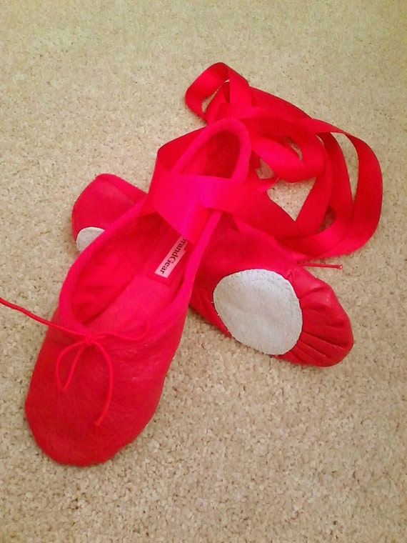 red ballet slippers with ribbons