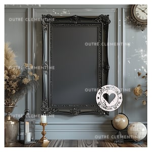 May include: A black framed mirror with ornate detailing hangs on a gray wall. A globe and a candle holder are on a wooden surface in front of the mirror. A white circle with the text "Made with Love" is visible in the lower right corner of the image.