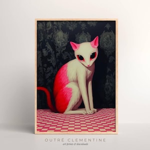 May include: Framed art print featuring a stylized cat with white fur and vibrant pink accents. The cat has large red eyes and is set against a dark floral background. The print is on a red and white checkered floor. The text "OUTRÉ CLEMENTINE" is at the bottom.
