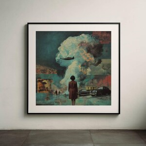 May include: A framed art print featuring a surreal collage. A person in a brown coat stands facing a large explosion with a plane flying above. The artwork has a vintage aesthetic with muted colors and a dramatic composition.