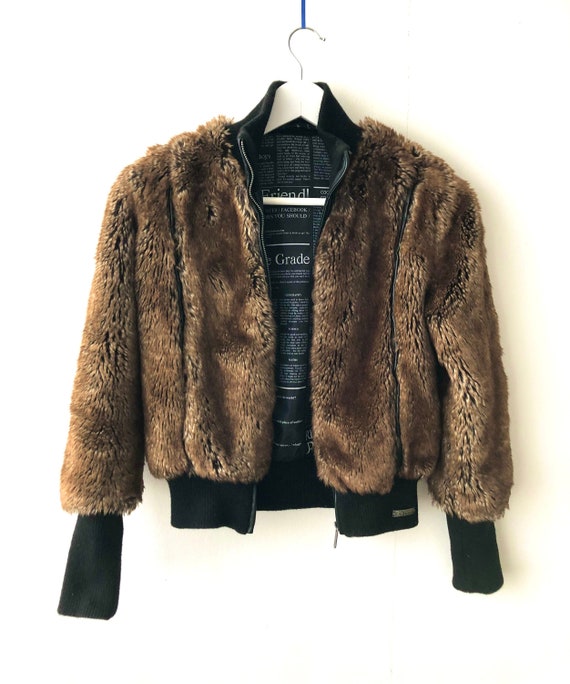 John Galliano fur bomber jacket newspaper print