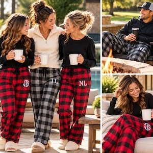 May include: Three pairs of flannel pajama pants featuring a buffalo check pattern in red and black or gray and black. Each pair includes a white embroidered monogram on the left hip. The pants have a black drawstring waist and loose fit.