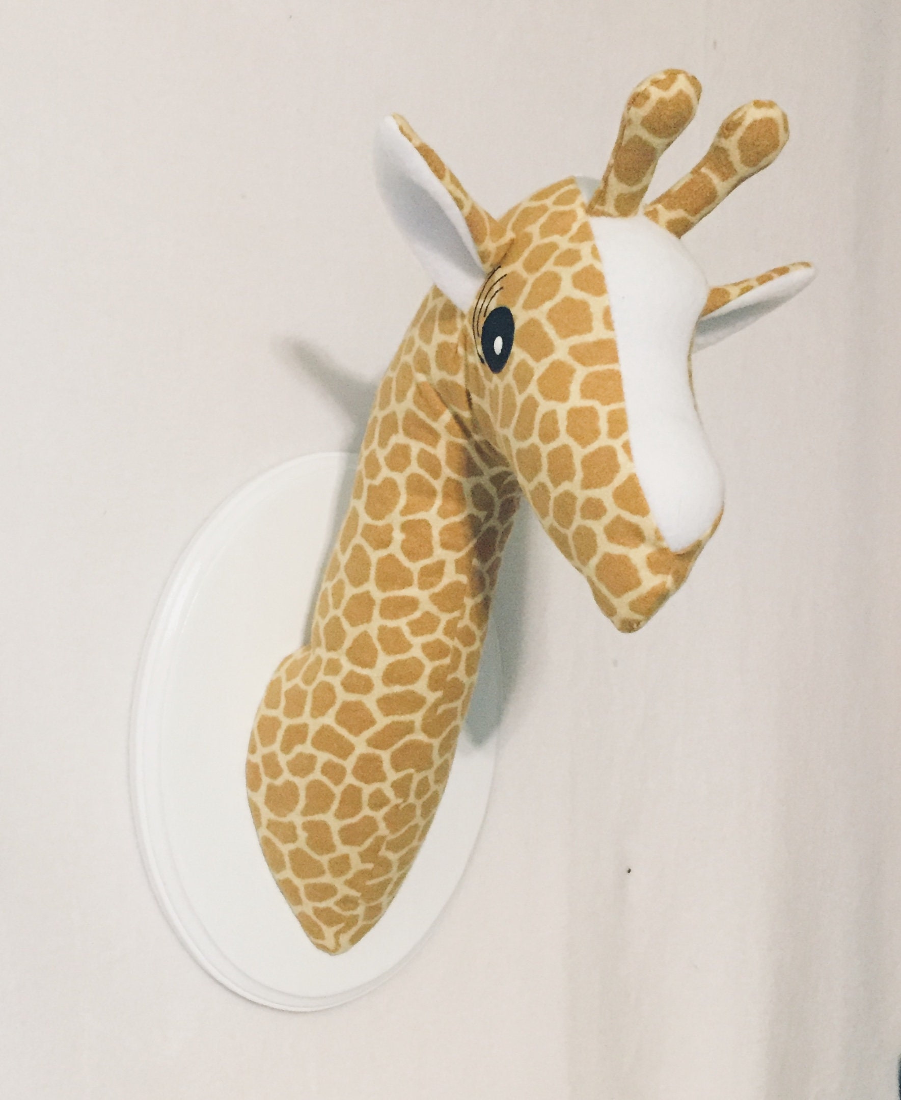 stuffed giraffe head wall mount
