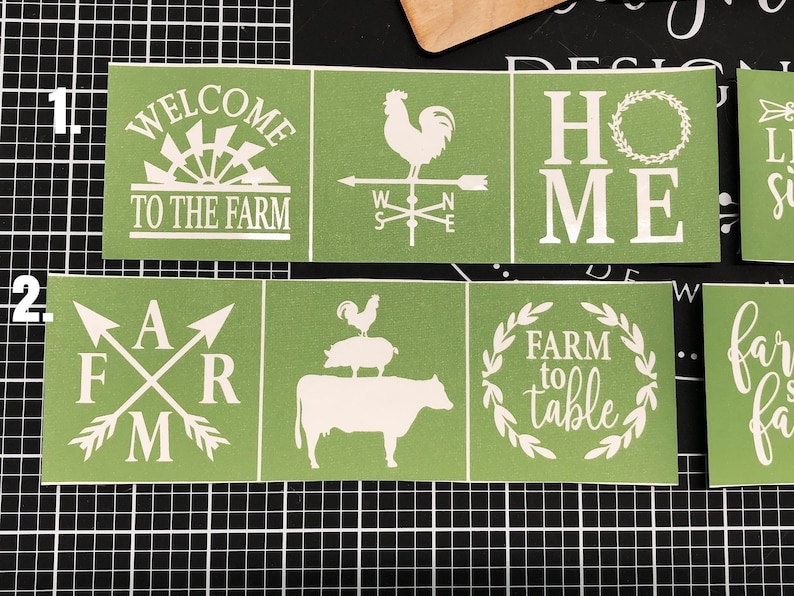 May include: Green stencil sheets with white vinyl cutouts of various farm-themed designs, including "Welcome to the Farm", a rooster weather vane, "Home", "Farm to Table", and "Farm Fresh".
