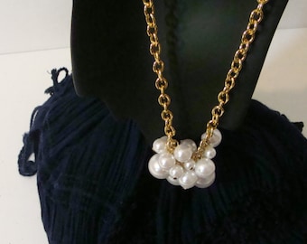 White pearl and gold necklace. A cluster of pearls!