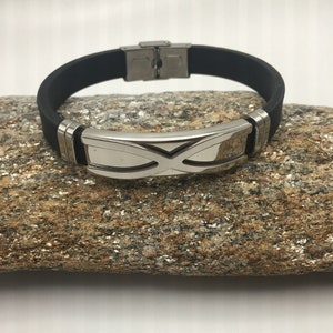 Men Stainless Steel Black Silicone Bracelet with Stainless steel closure.