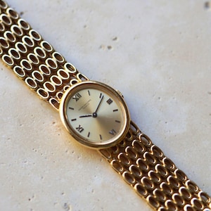 Patek Philippe Ref. 4180 Oval Women’s 18k Gold Bracelet Watch Manual Wind 21 mm 1970s